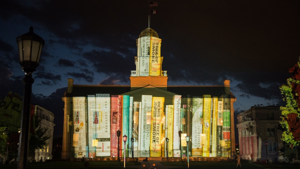 Projection of books from special collections at the University of Iowa onto the Old Capitol Museum during Gary Hoffstetter's Light Art event.